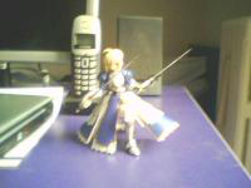 Saber and two swords